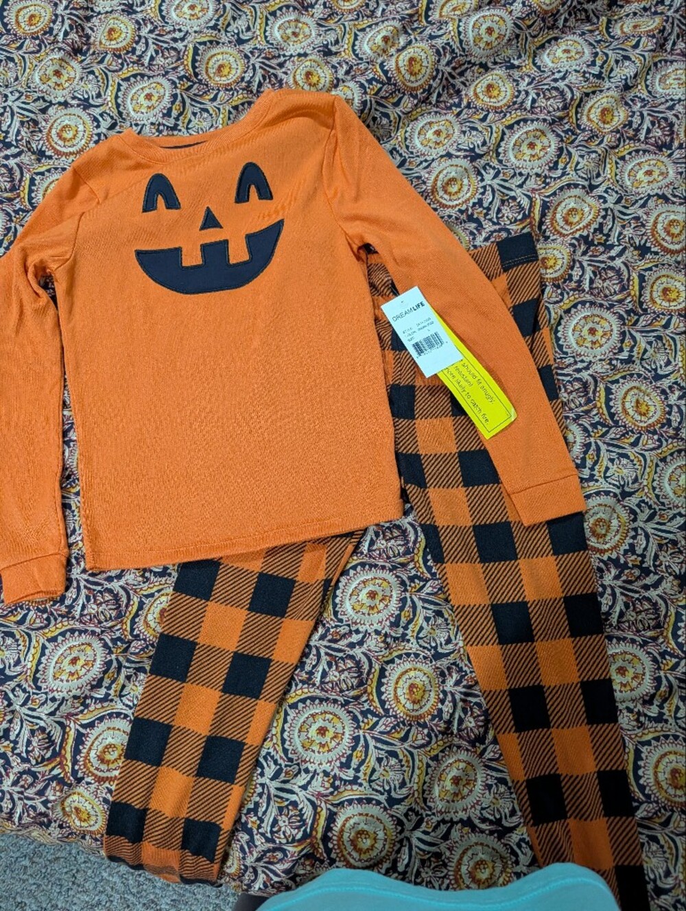 Kids Orange Pumpkin Face Pajama Set with Buffalo Check Pants